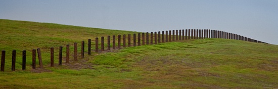 System of bollards and cables protect the William Blair Jr. Park Levee System and the back side of the park from vehicles